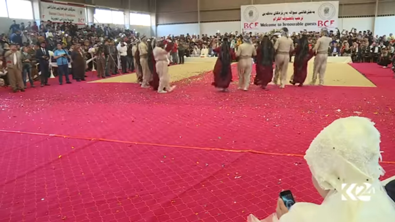 بالصور.. اربيل تحتضن عرسا جماعيا لـ 214 شابا وشابة